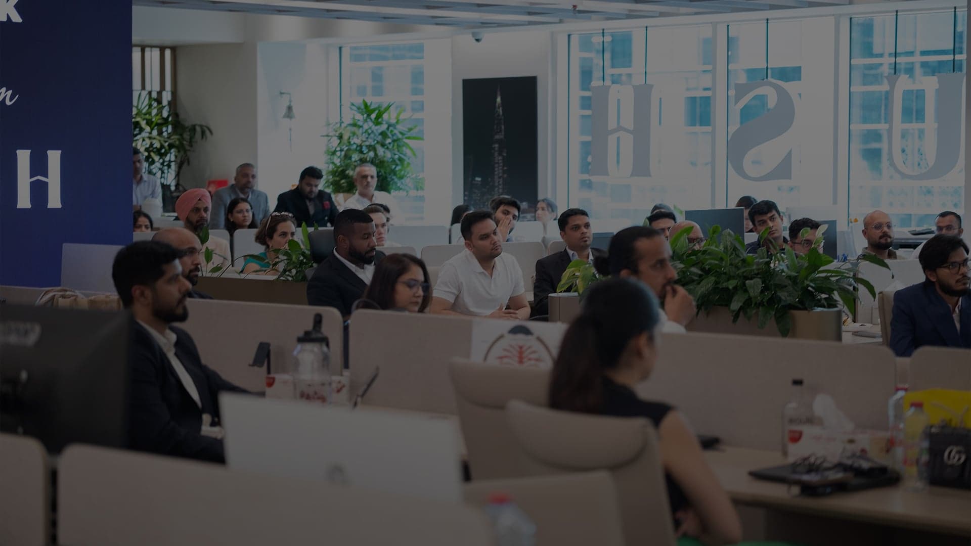 Union Square House consultants with clients at a Dubai property briefing