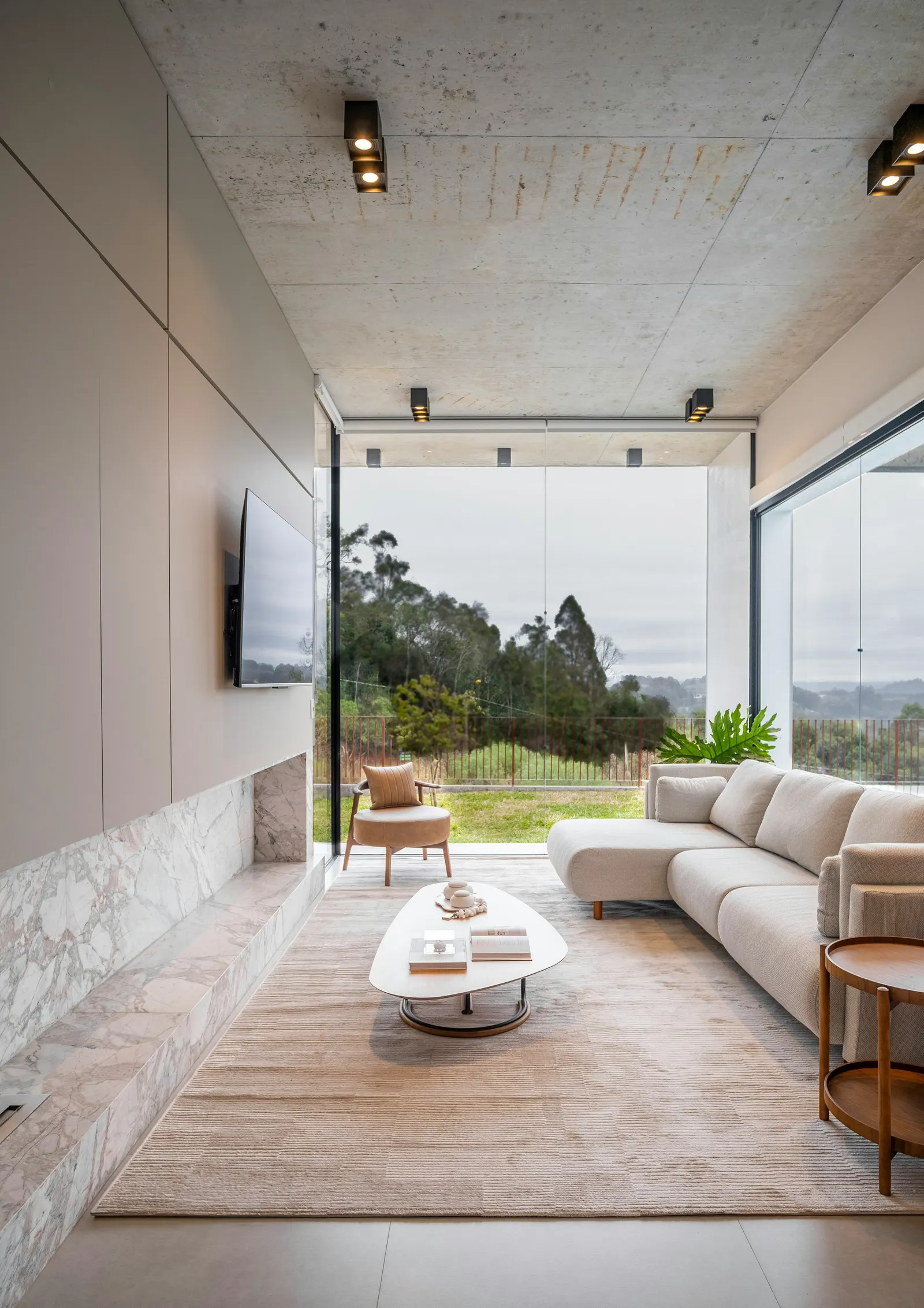 Bright living room with floor-to-ceiling windows